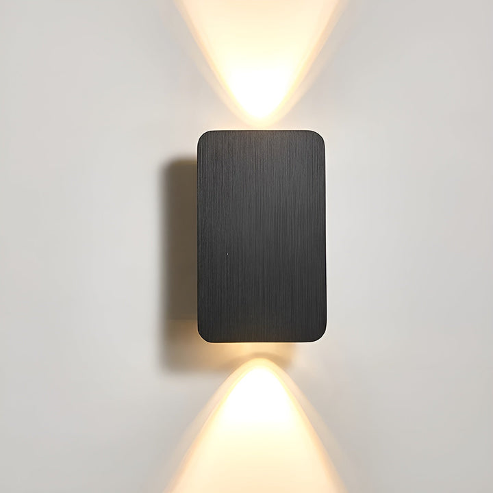 Minimalist LED wall light in aluminum, perfect for modern home decor. Energy-efficient accent lighting.