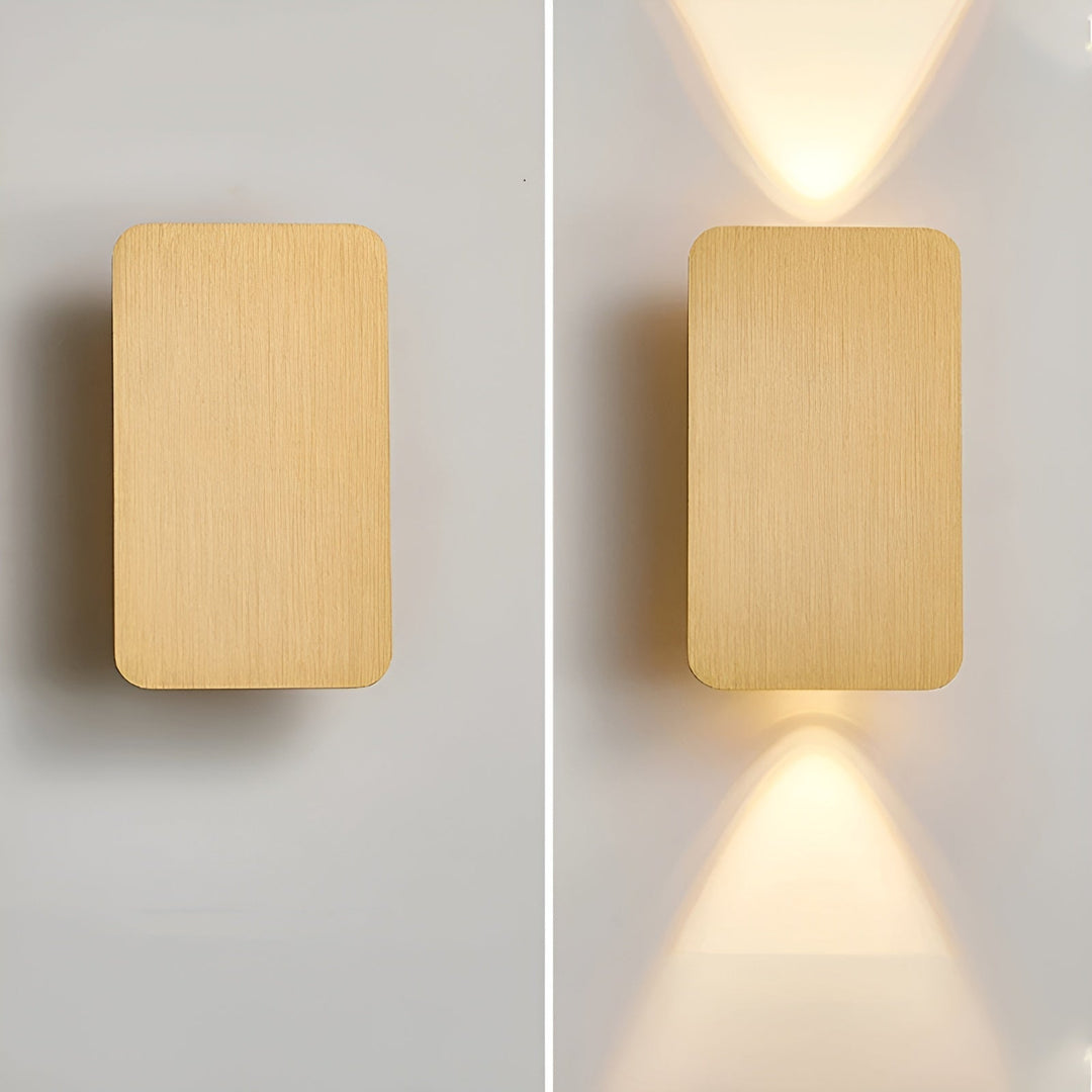 Sleek aluminum minimalist LED wall light. Modern, energy-efficient home decor for living rooms or hallways.