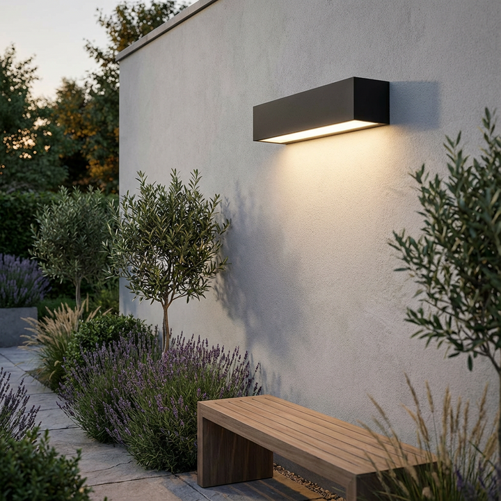 Stylish minimalist solar outdoor LED wall light, IP65 rated for garden, patio, and exterior lighting.