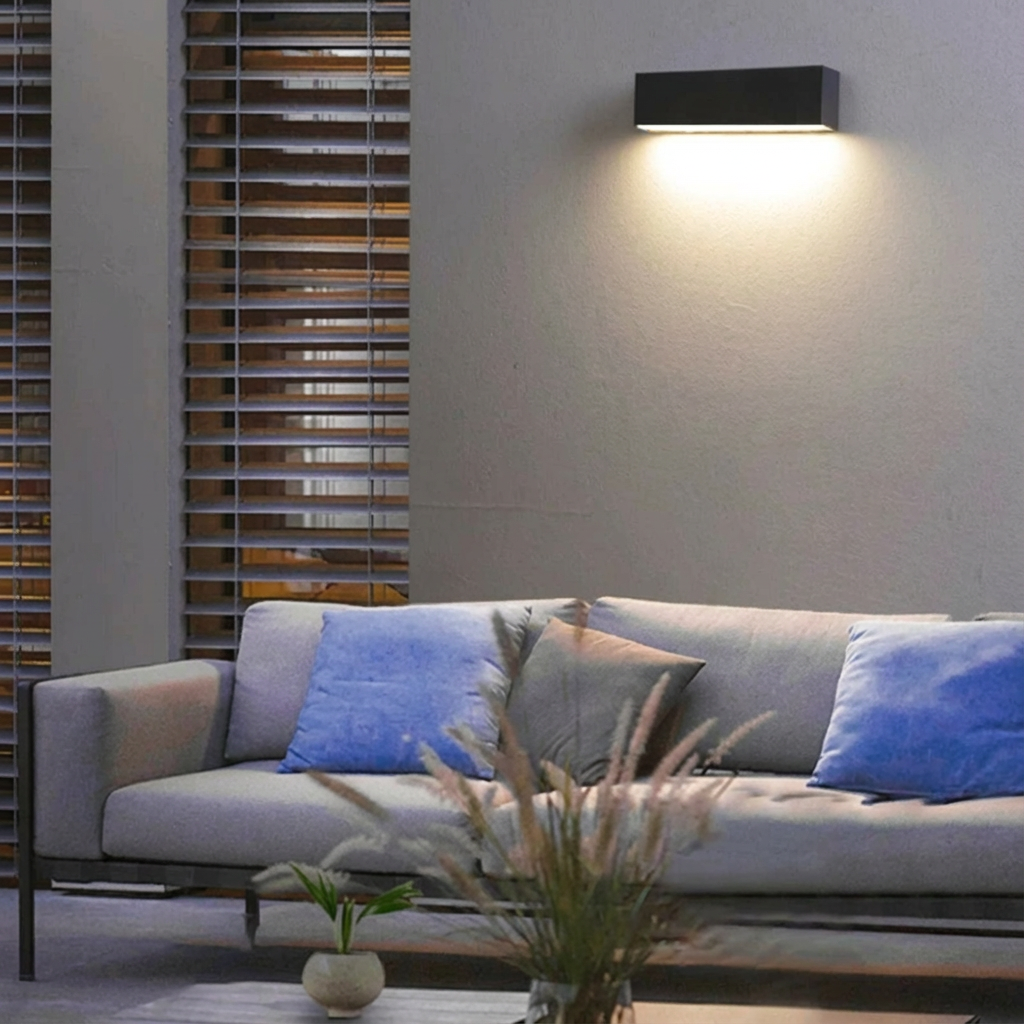Premium solar LED outdoor wall light, minimalist design, enhances garden and facade with bright, efficient light.