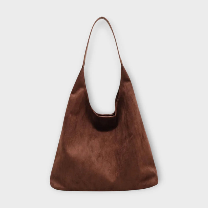 Minimalist women's hobo shoulder bag with a single strap, perfect for everyday style.