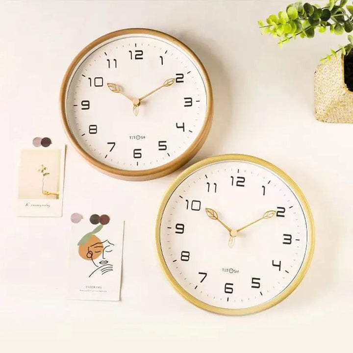 Elegant wooden wall clock with a minimalist, silent design. Perfect modern home decor for any room.