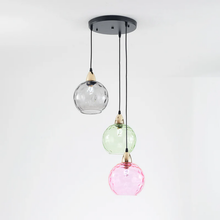 Sleek modern 3-light cluster pendant lamp, elegant indoor lighting with a unique design.