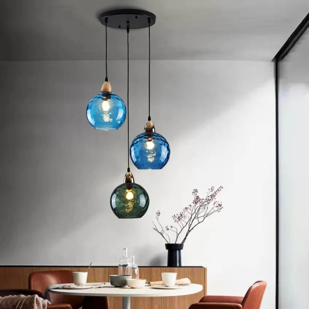 Elegant three-light cluster pendant lamp, a modern decorative ceiling fixture for homes.