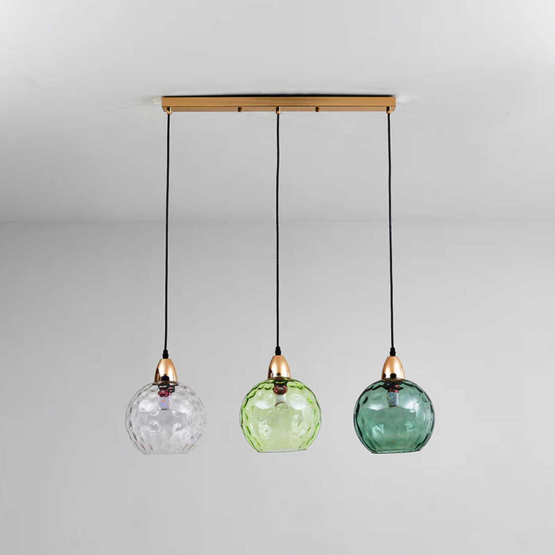 Three-light modern cluster pendant, decorative LED indoor lighting with a sleek design.