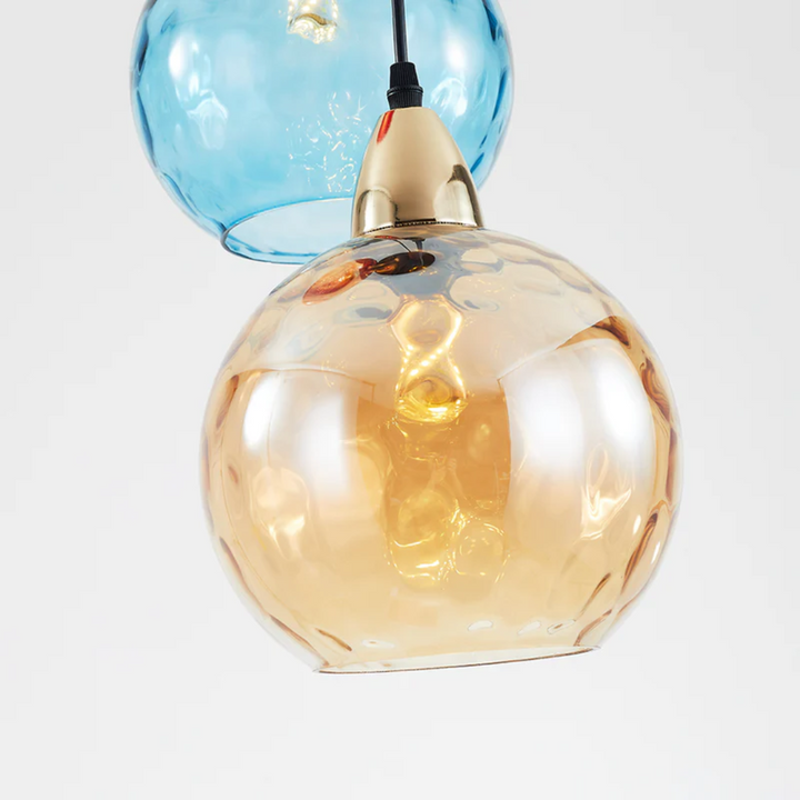 Living room's modern 3-light cluster pendant lamp, unique design LED ceiling light solution.