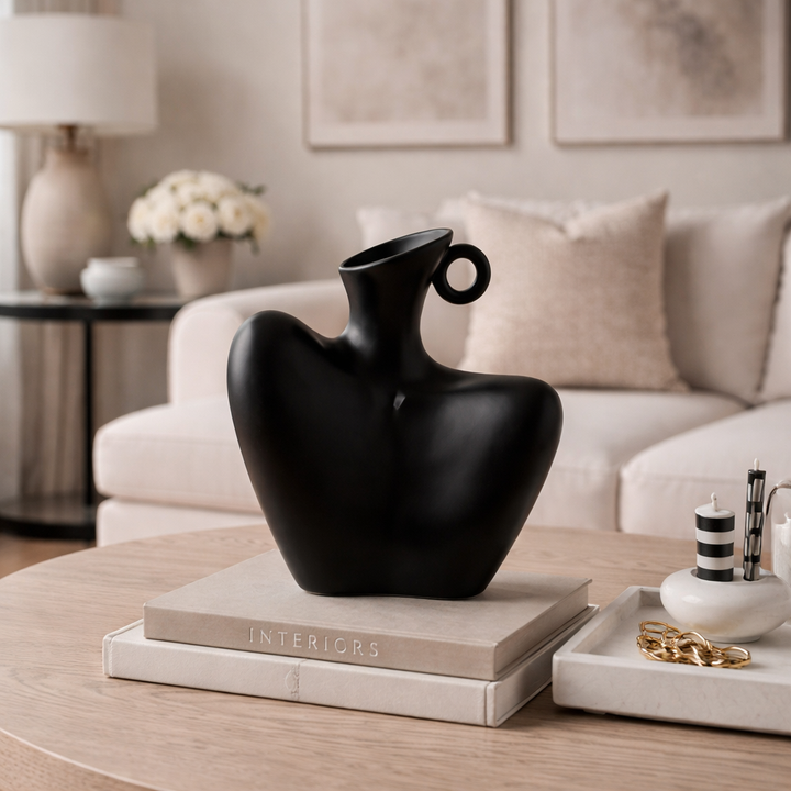 Unique abstract ceramic decorative vase, a contemporary home decor centerpiece. Ideal for modern table settings.
