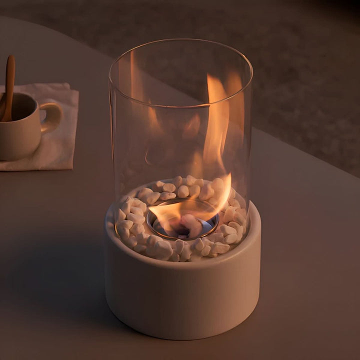 Clean flame bioethanol table fireplace. Smokeless indoor/outdoor ambiance, modern glass & metal design.