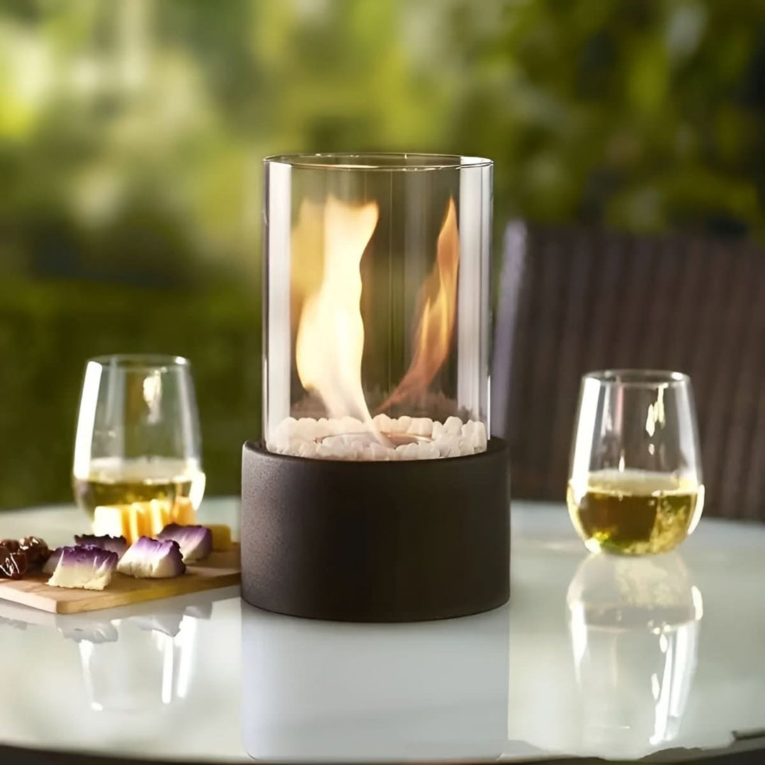 Modern glass & metal bioethanol table fireplace. Portable decor for elegant indoor/outdoor ambiance.