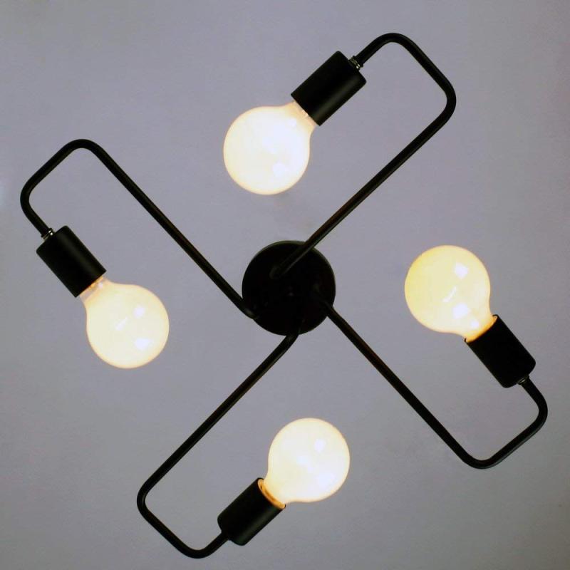 Elegant black flush mount LED light, perfect as a bedroom or living room ceiling fixture.