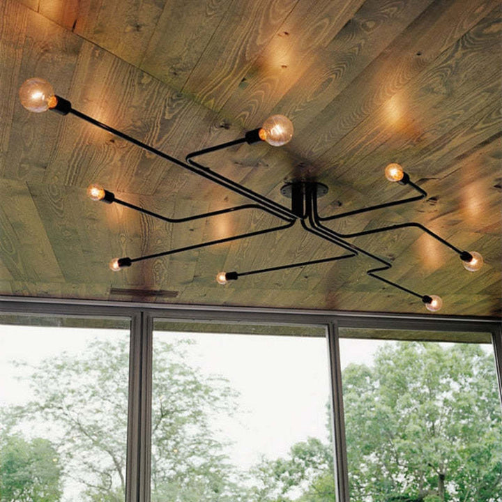 Durable black flush mount ceiling light, an industrial style hardwired LED fixture for indoors.