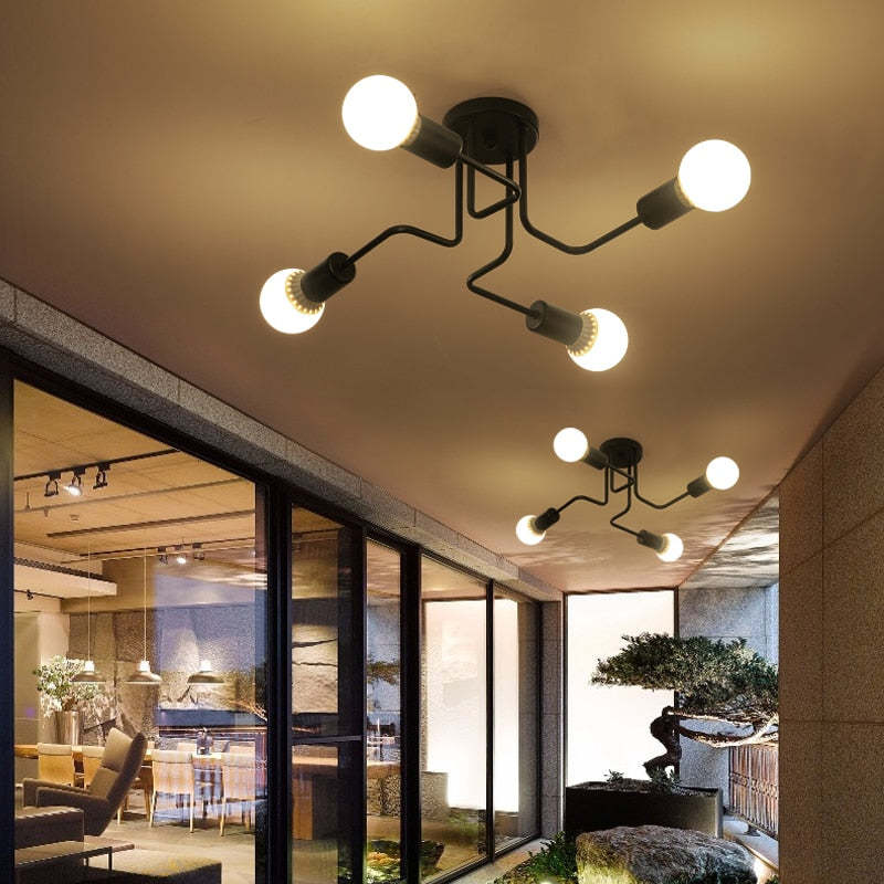 Industrial style black flush mount LED light, a hardwired indoor ceiling fixture.