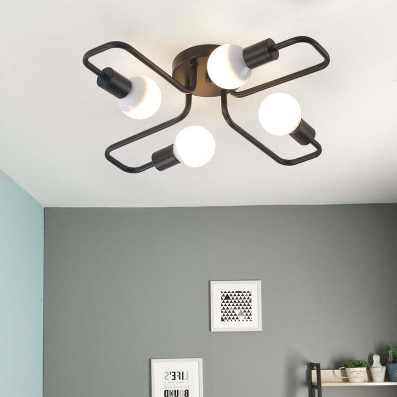 Vintage-inspired black flush mount ceiling light, enhancing home decor with LED brightness.