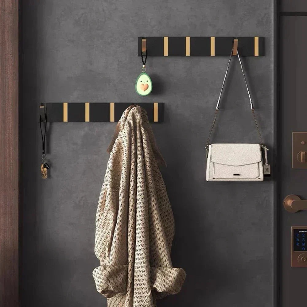 Space-saving wall hook, folds flat. Perfect for bathroom towel storage or kitchen organizer.