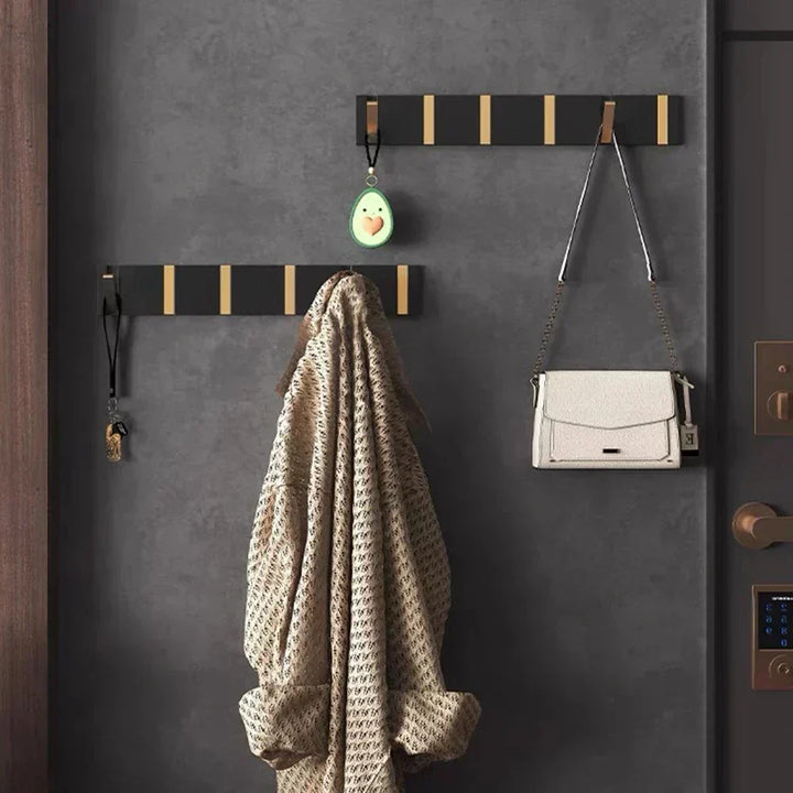 Space-saving wall hook, folds flat. Perfect for bathroom towel storage or kitchen organizer.