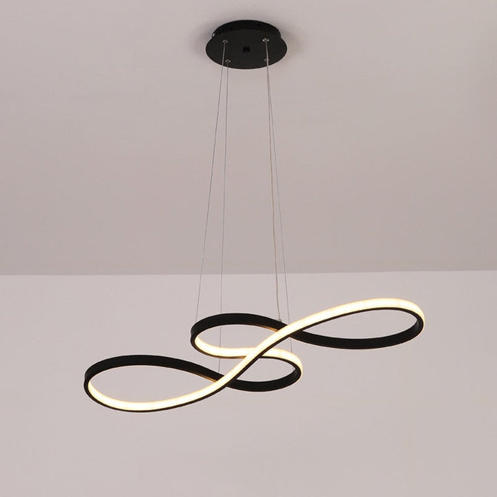 Designer gold linear pendant, ideal adjustable lighting for a sophisticated living room ambiance.