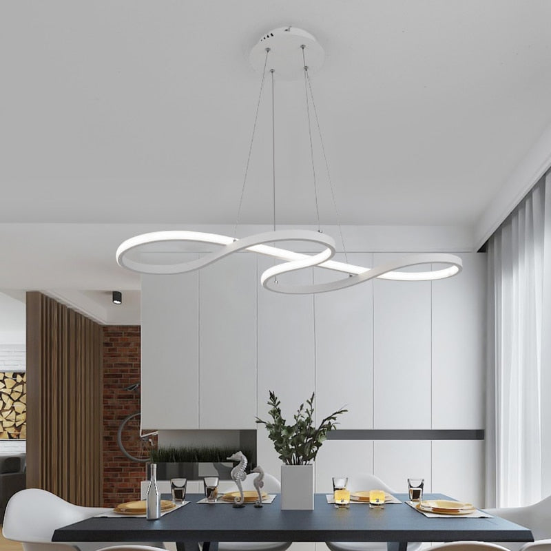 Adjustable modern linear pendant light in black, designer lighting for dining rooms or hallways.