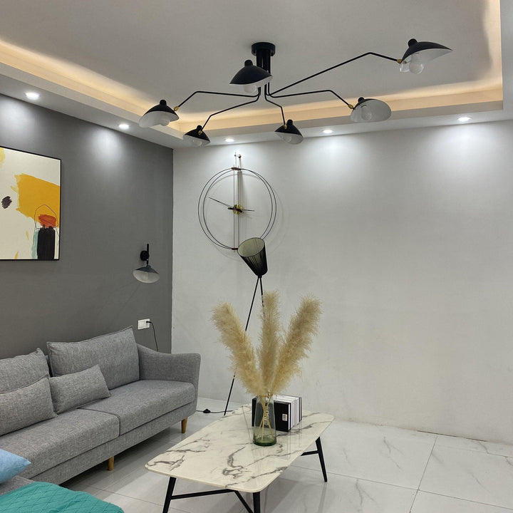 Adjustable multi-arm ceiling lamp, modern black, for dynamic home lighting.