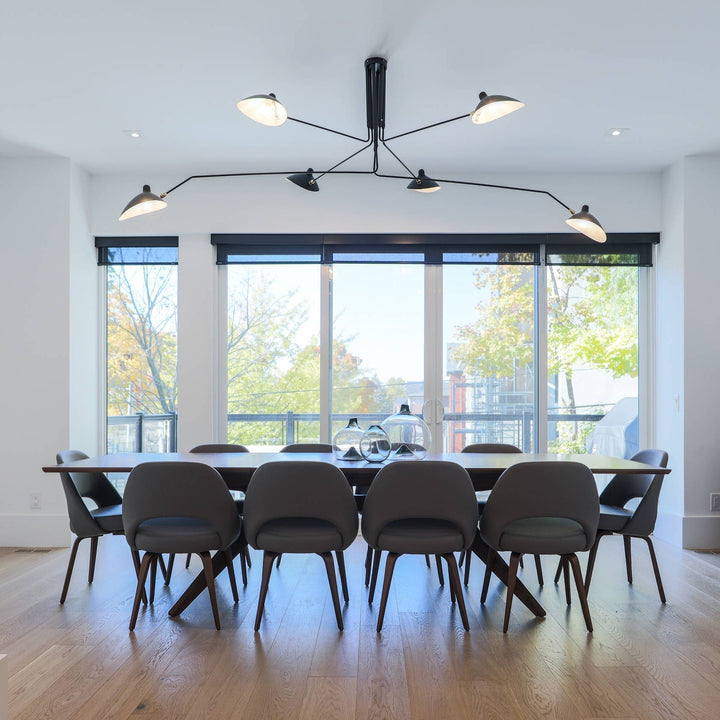 Adjustable multi-arm ceiling lamp, minimalist design, black finish.