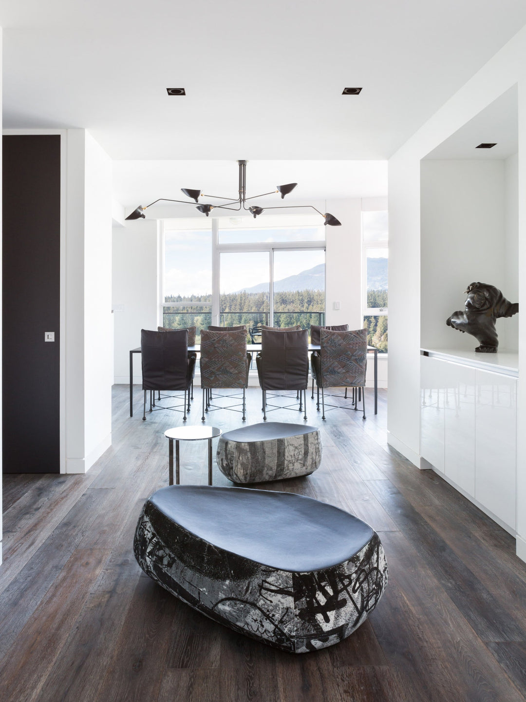 White adjustable multi-arm ceiling lamp, sleek and functional lighting.