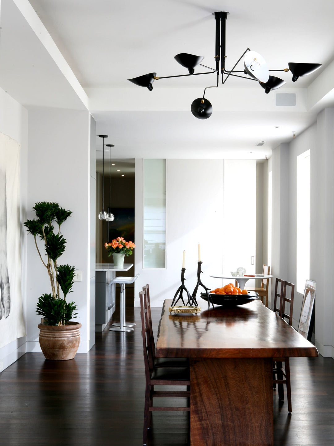 Contemporary adjustable white multi-arm ceiling light, elegant style.