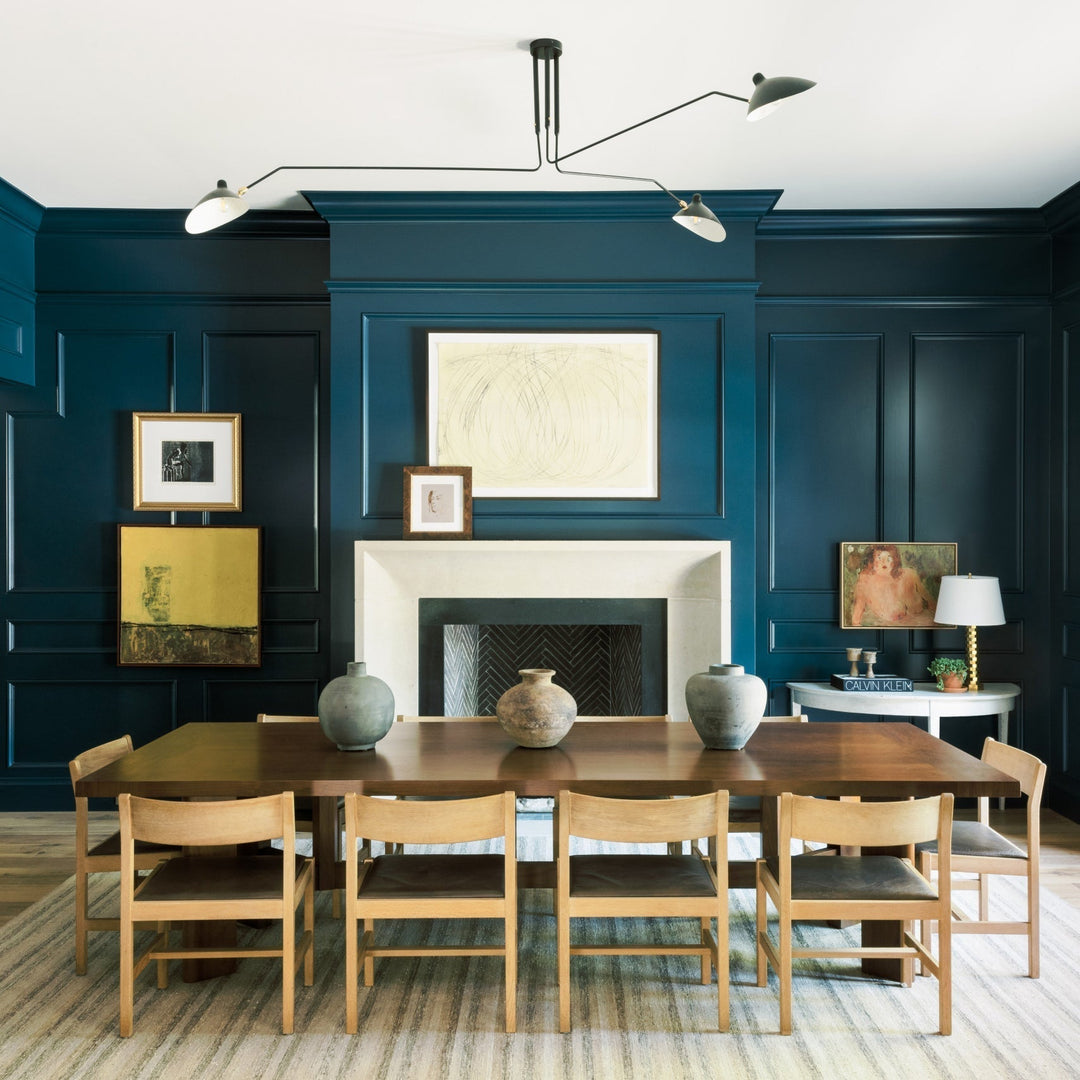 Sleek black multi-arm ceiling lamp, modern adjustable lighting fixture.