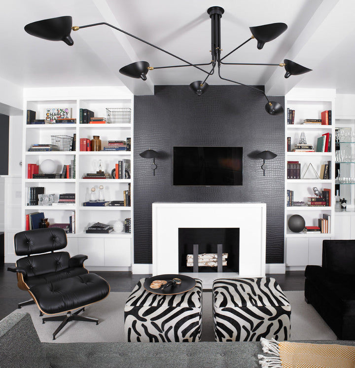Adjustable white multi-arm ceiling lamp, dynamic lighting for modern rooms.