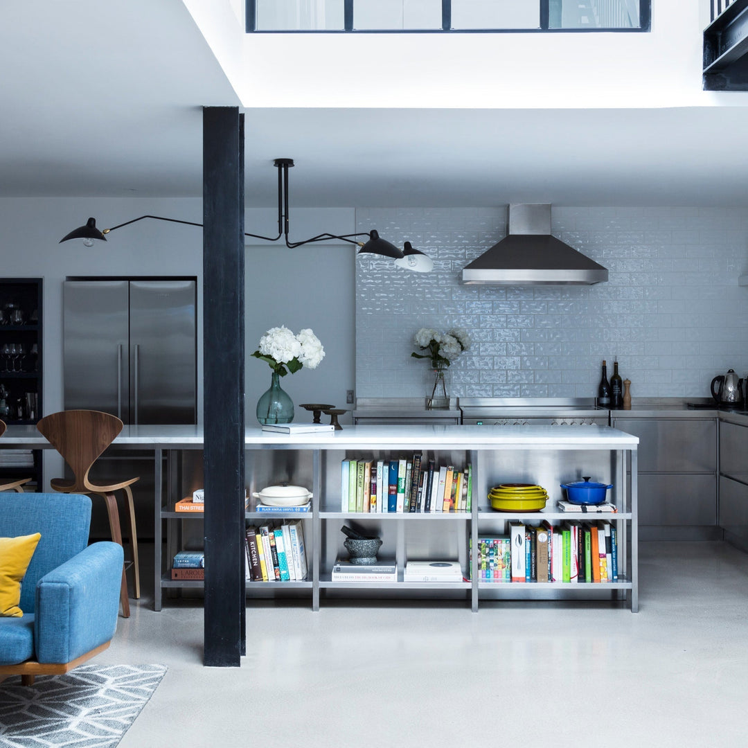 White multi-arm adjustable ceiling fixture, bringing modern light home.