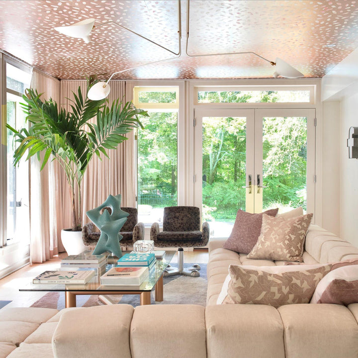 White multi-arm adjustable lighting, contemporary design for living spaces.