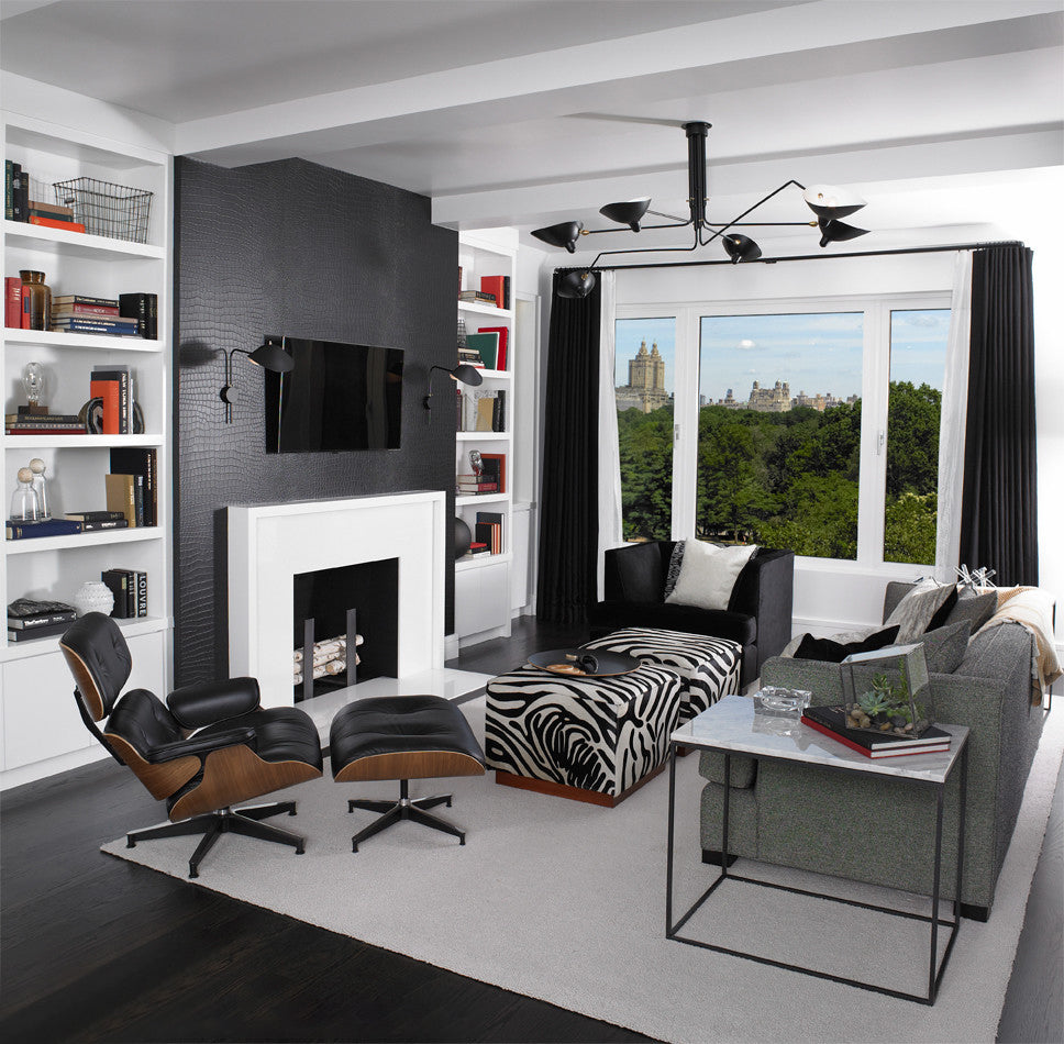 Black multi-arm ceiling light, adjustable, for a sleek modern look.