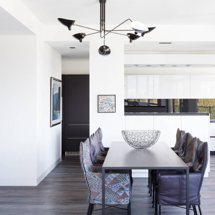 Dynamic white multi-arm ceiling light, adjustable, perfect for modern homes.
