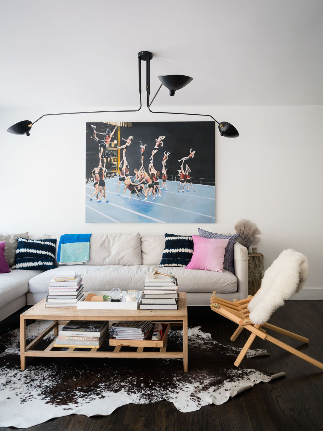 Contemporary white multi-arm adjustable lamp, ideal for home lighting.