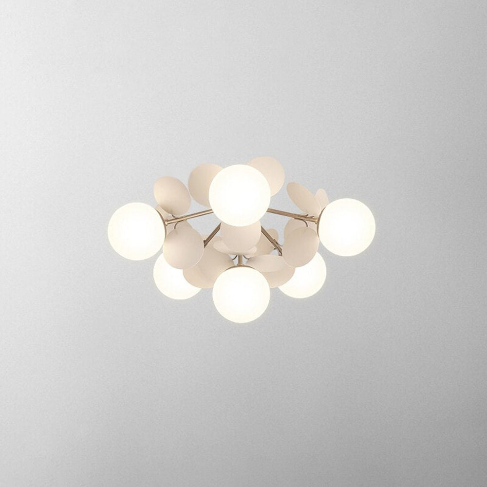 Contemporary flush mount branch chandelier, nature-inspired light with glass shades.