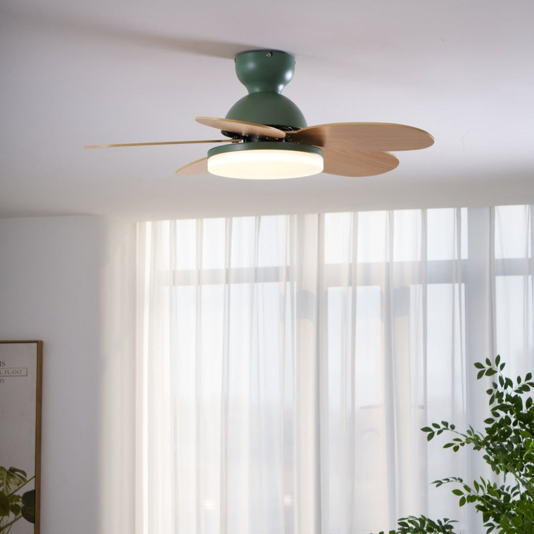 Quiet ceiling fan with warm integrated LED light, enhancing home ambiance.