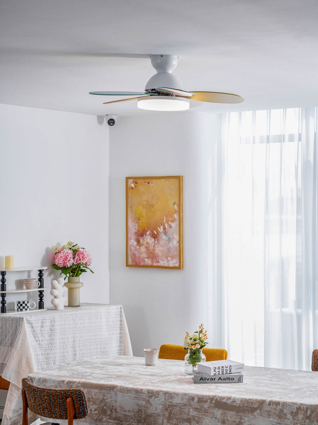 Indoor ceiling fan with warm LED light, modern, and ideal for any room.