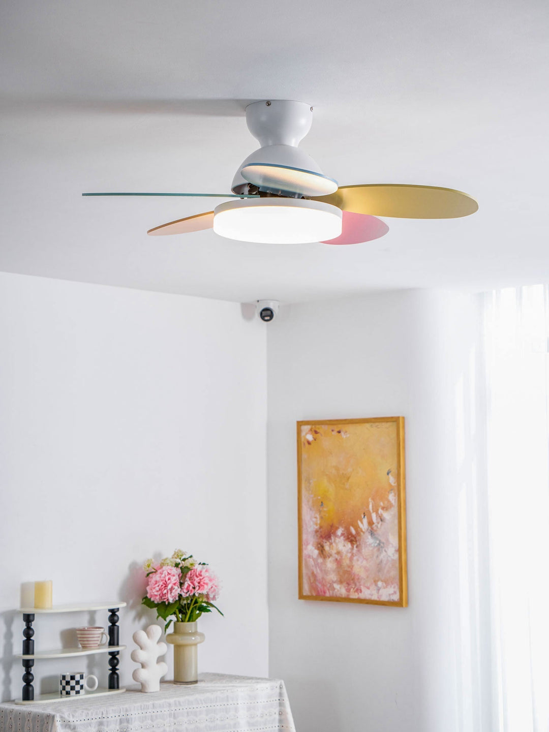 Living room modern fan with warm LED light, stylish, and energy-saving.