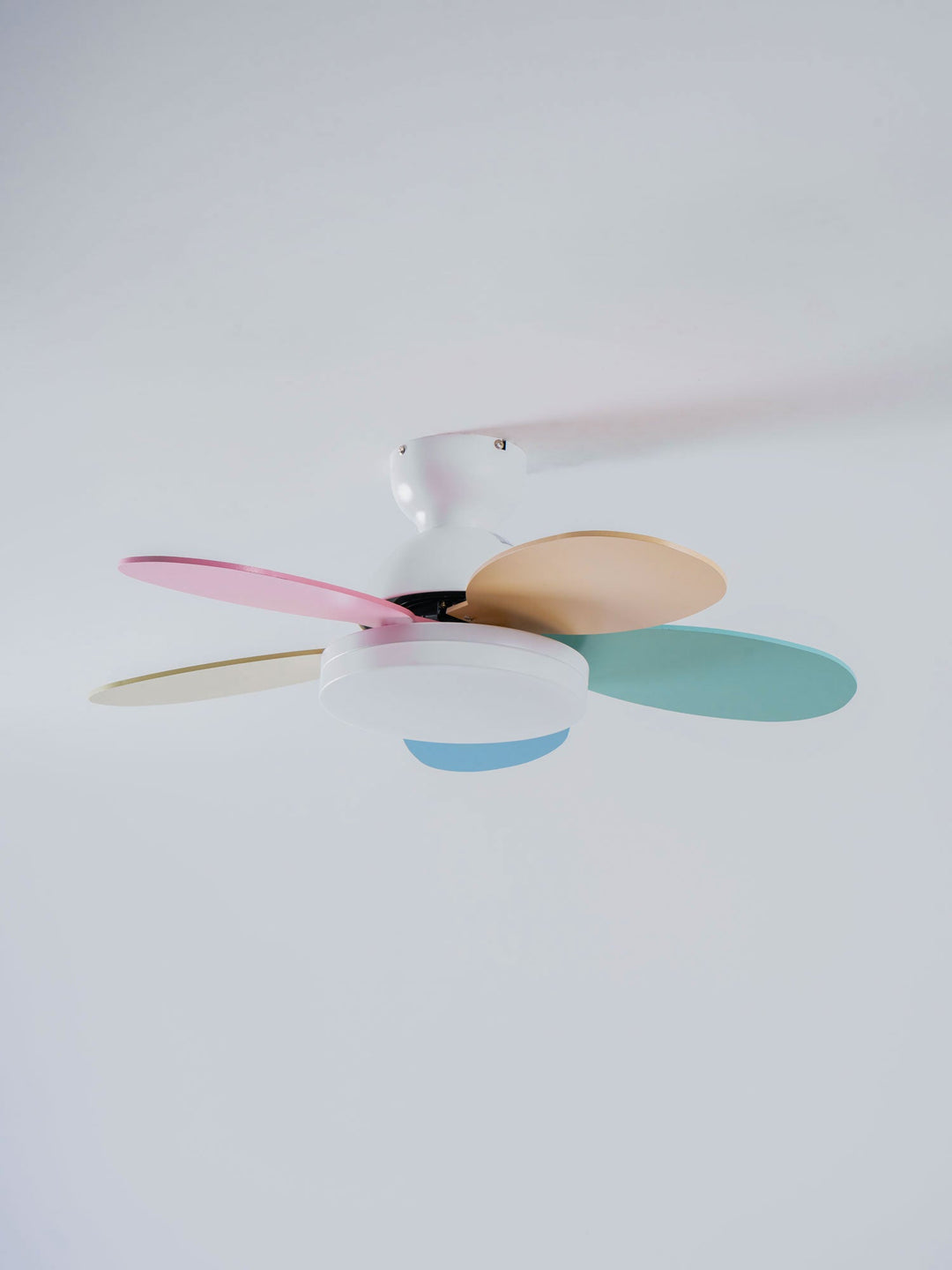 Indoor contemporary fan with warm LED light, wooden blades, and quiet function.