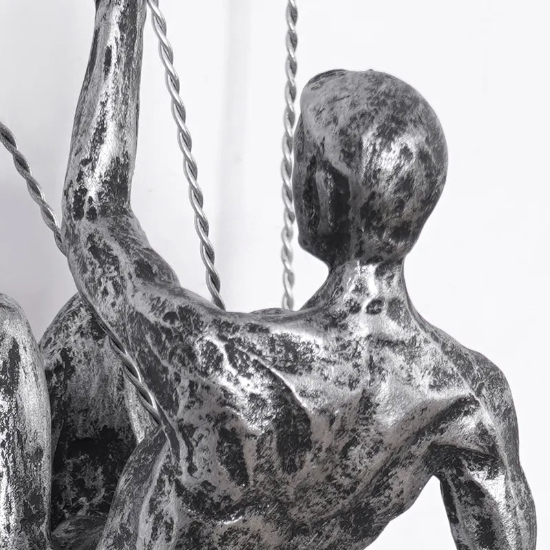 Home decor: modern climbing figures wall sculpture, unique and stylish.
