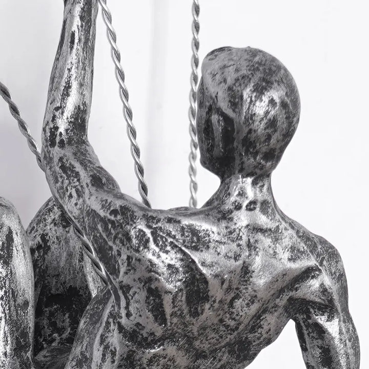Home decor: modern climbing figures wall sculpture, unique and stylish.