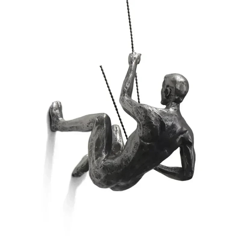 Unique modern climbing figures wall decor, artistic home accent.
