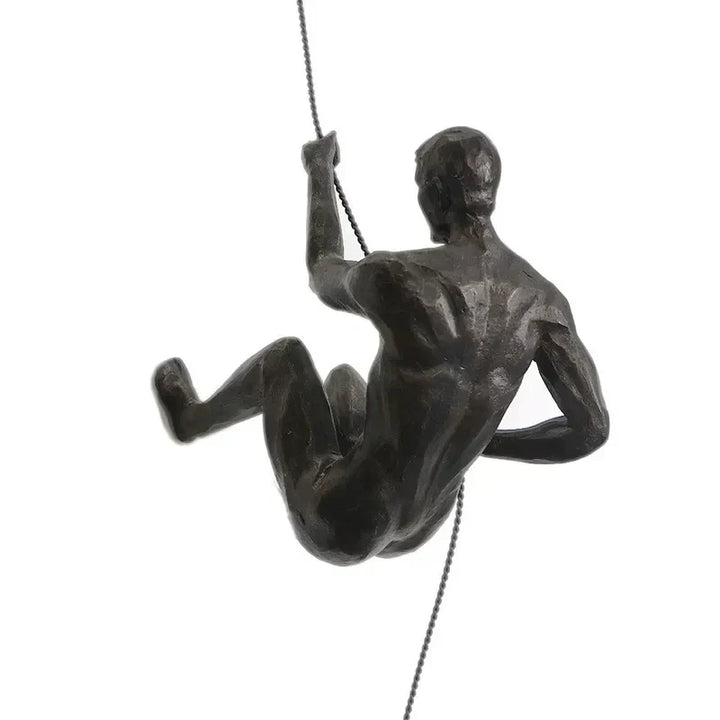Elegant climbing men wall sculpture, modern art for stylish home decor.
