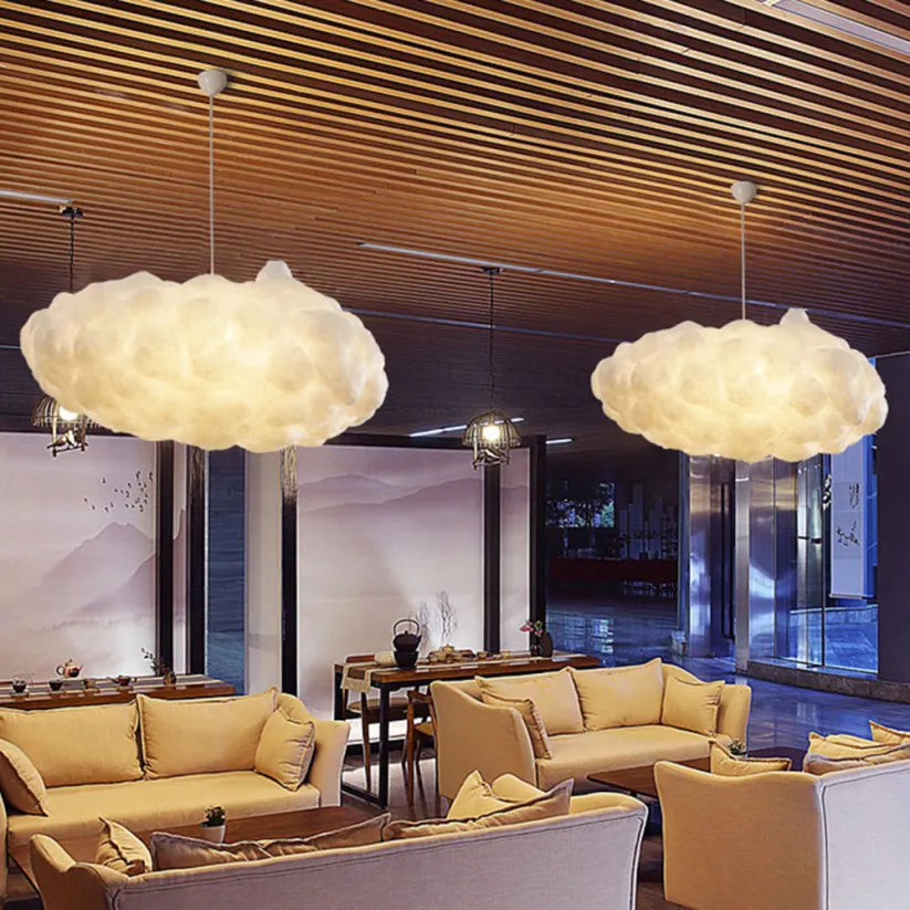 Modern cloud design pendant light fixture for contemporary home decor. Elegant ambient ceiling lamp.
