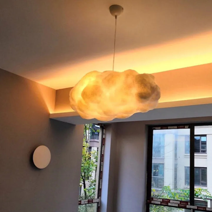 Elegant cloud pendant lamp, a modern ceiling light fixture for contemporary interior design and ambient home lighting.