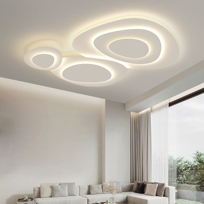 Dimmable LED flush mount ceiling light with cloud design, provides bright white light.