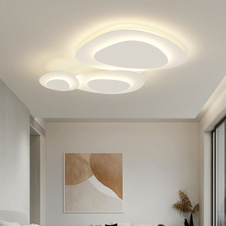 Energy-efficient LED cloud ceiling light, dimmable, brightens modern living rooms.