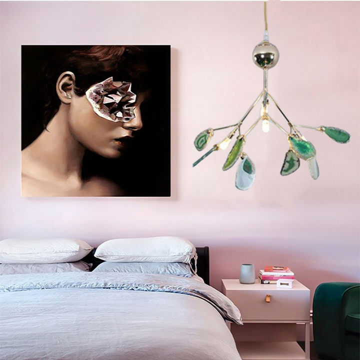 Decorative colorful LED chandelier, sleek metal finish, modern home.