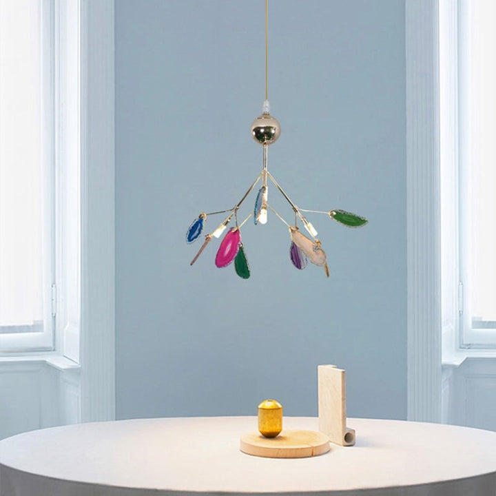 Vibrant LED chandelier, modern aesthetic, colorful illumination for rooms.