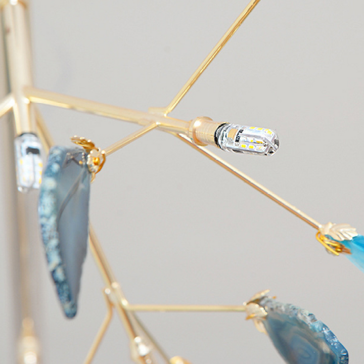 Contemporary colorful LED chandelier, metal frame, vibrant home decor.