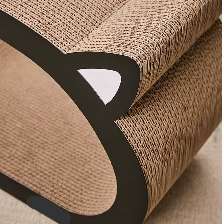 Modern cat furniture: a corrugated cardboard scratching lounge and pet bed for happy, healthy felines.