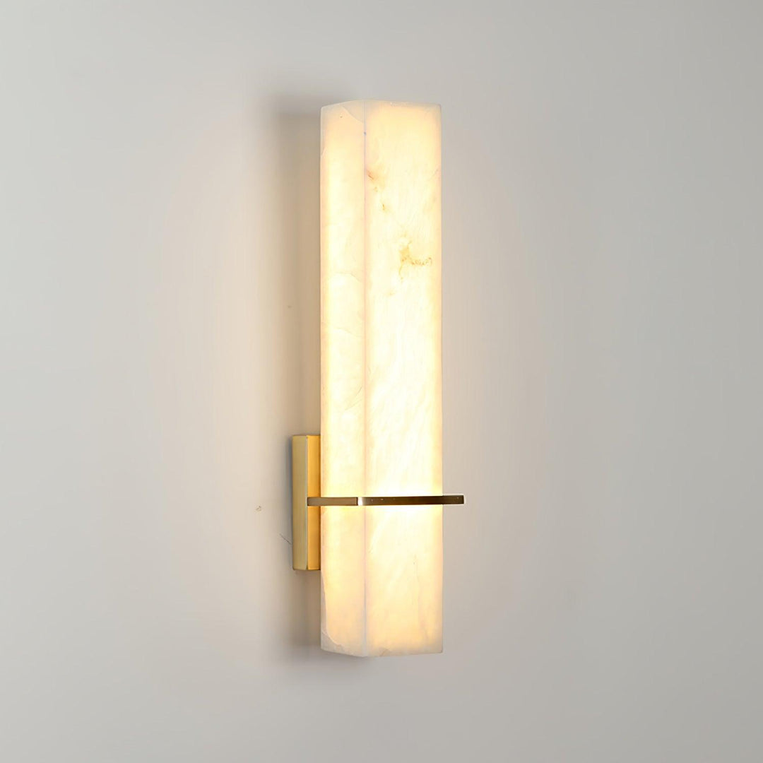 Minimalist hardwired cuboid indoor wall lamp, ideal for bedroom ambient lighting.